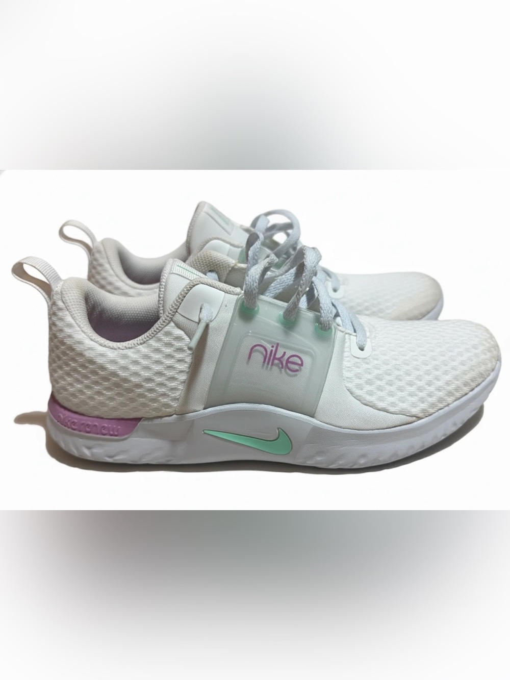 Nike Women's Renew In Season TR 10, color White Violet Shock. Size 10